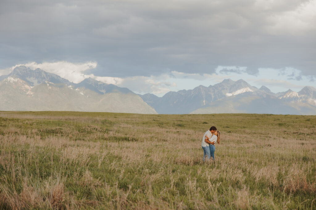 Couple kissing featured in montana bride