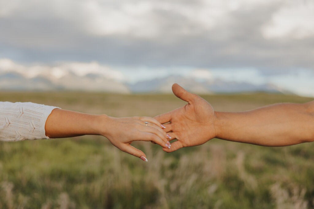 Holding hands in montana engagement session