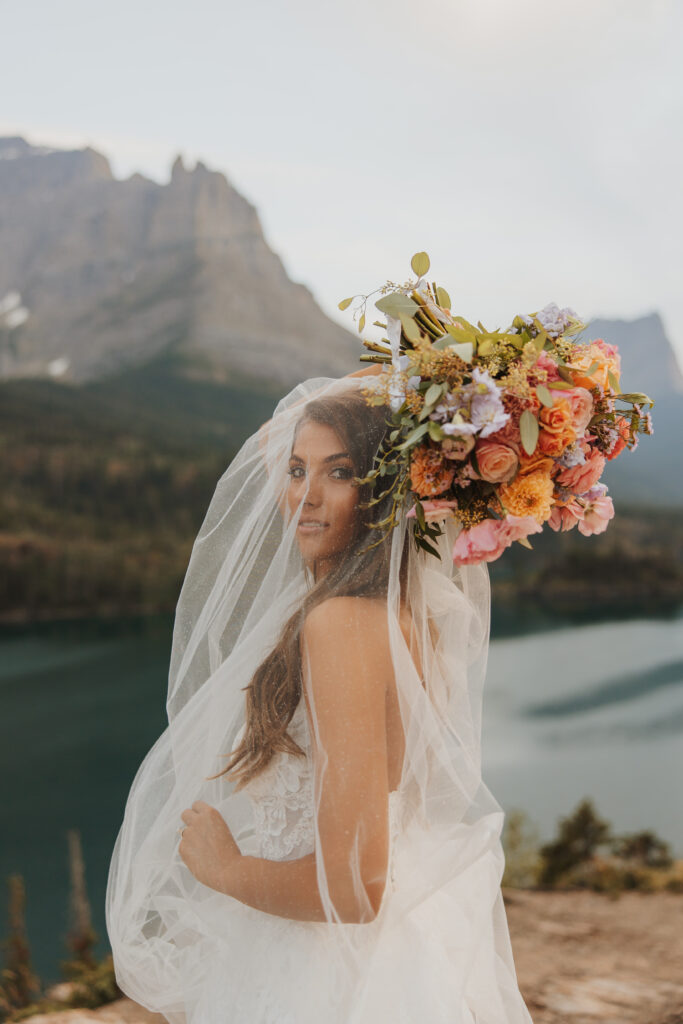 veil over brides face on going to the sun road in montana