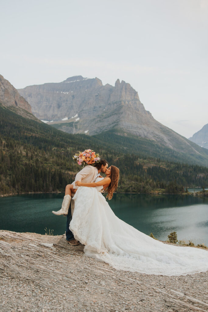 bride and groom dip kiss
by st marys lake