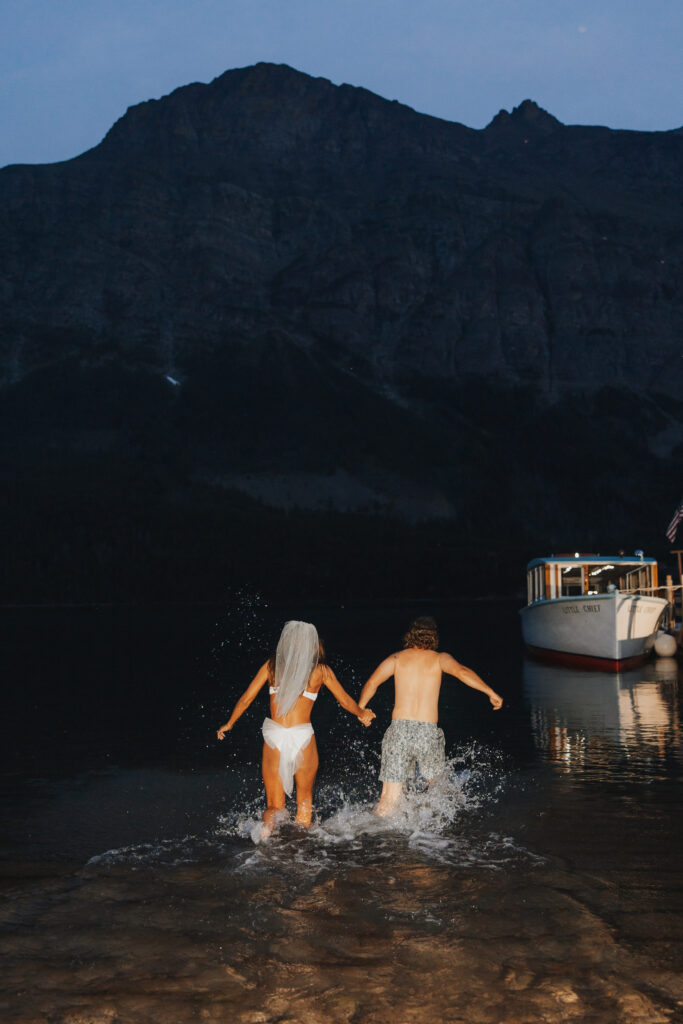 Bride and groom late night swim run